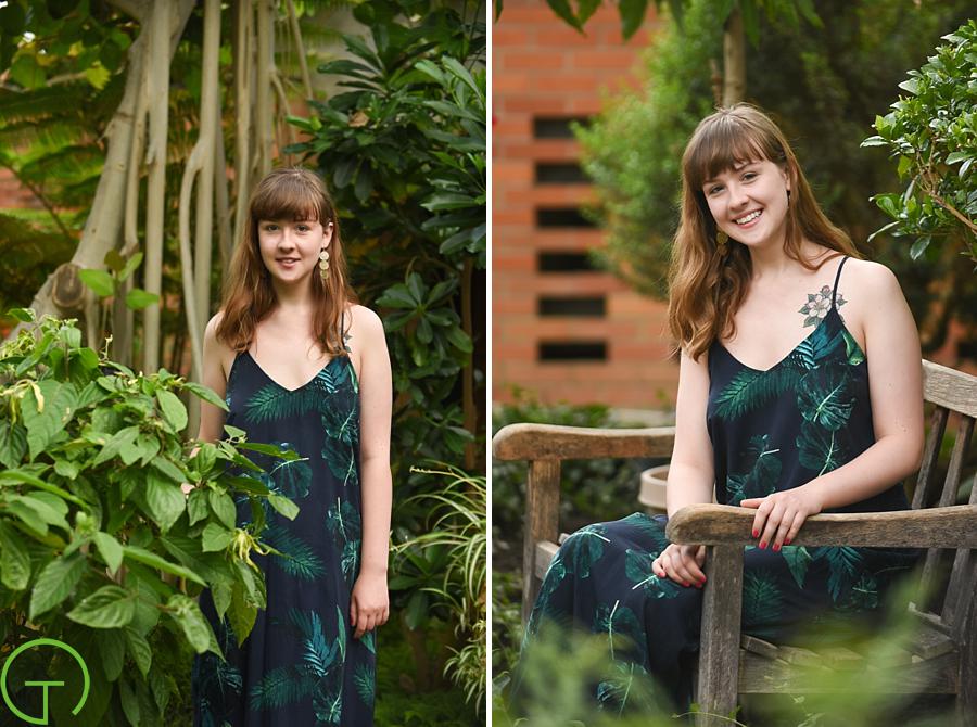 A teenager poses in the Conservatory at Matthaei Botanical Gardens for her senior session
